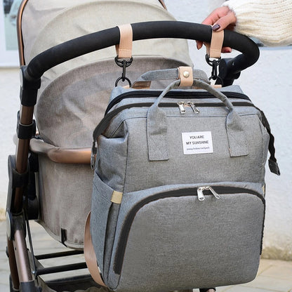 Baby diaper backpack with changing station